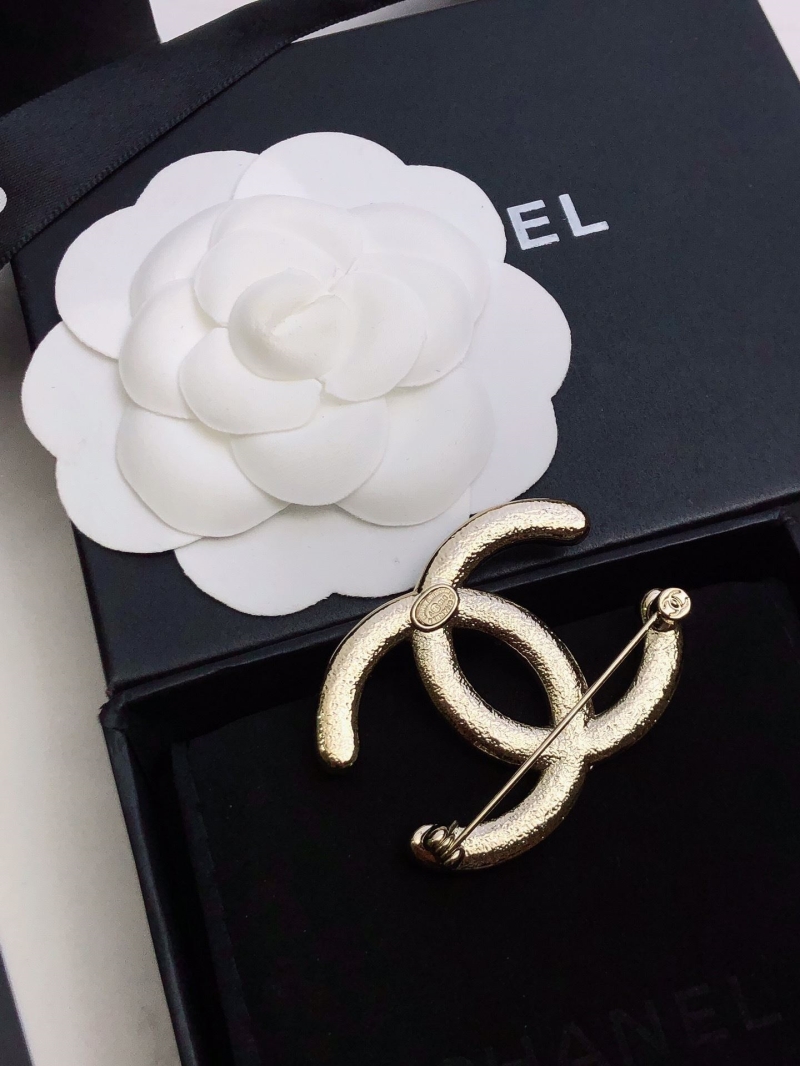 Ch**el brooches